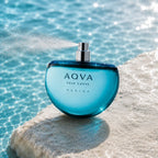 Bvlgari Aqva Marine Pour Homme EDT 100ml perfume bottle releasing a fresh fragrance mist Perfumesouq Qatar