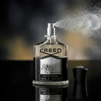 Creed Aventus perfume spray with elegant mist highlighting fresh and smoky fragrance from Perfumesouq Qatar