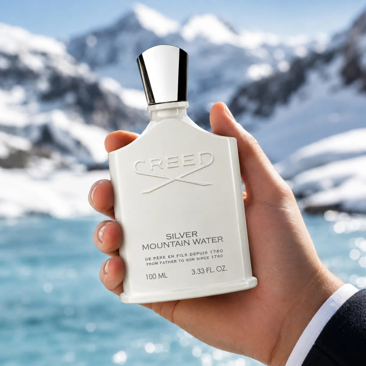 Person holding Creed Silver Mountain Water Eau de Parfum 100ml perfume bottle | Perfume Souq Qatar