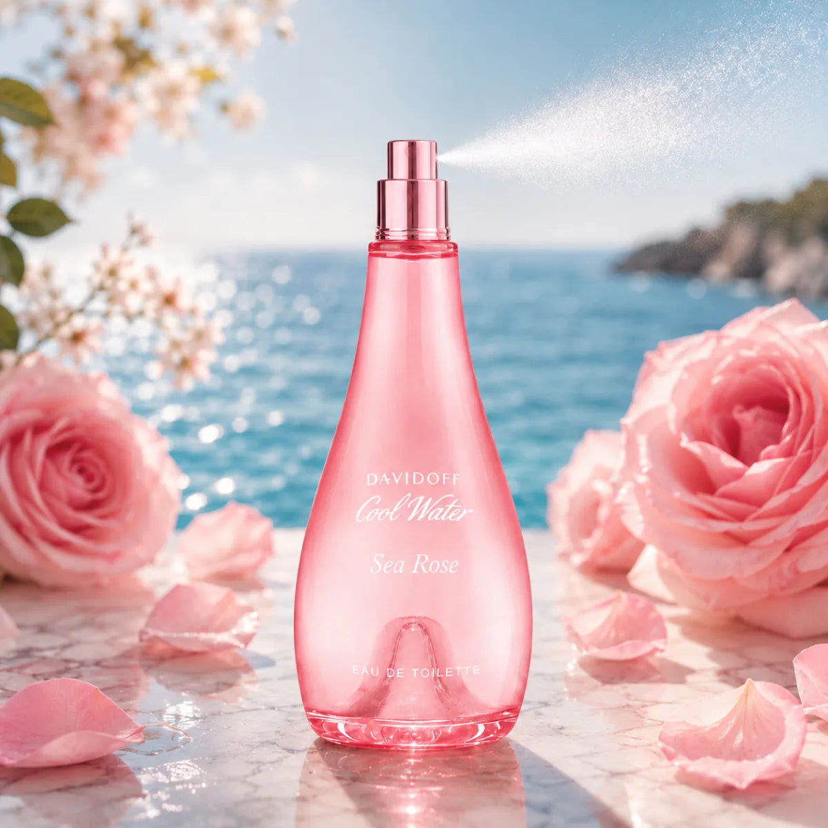 Davidoff Cool Water Sea Rose Eau de Toilette 100ml bottle spraying a delicate fragrance mist with soft pink roses and a fresh seaside-inspired luxury background | Perfumesouq qatar