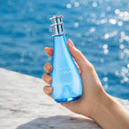 Woman holding Davidoff Cool Water Women EDT 100ml perfume bottle | Perfume Souq Qatar