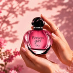 Woman holding Dior Poison Girl Eau de Parfum 100ml perfume bottle | Perfume Souq Qatar