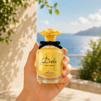 Woman holding Dolce & Gabbana Dolce Shine Eau de Parfum 75ML perfume bottle | Perfume Souq Qatar