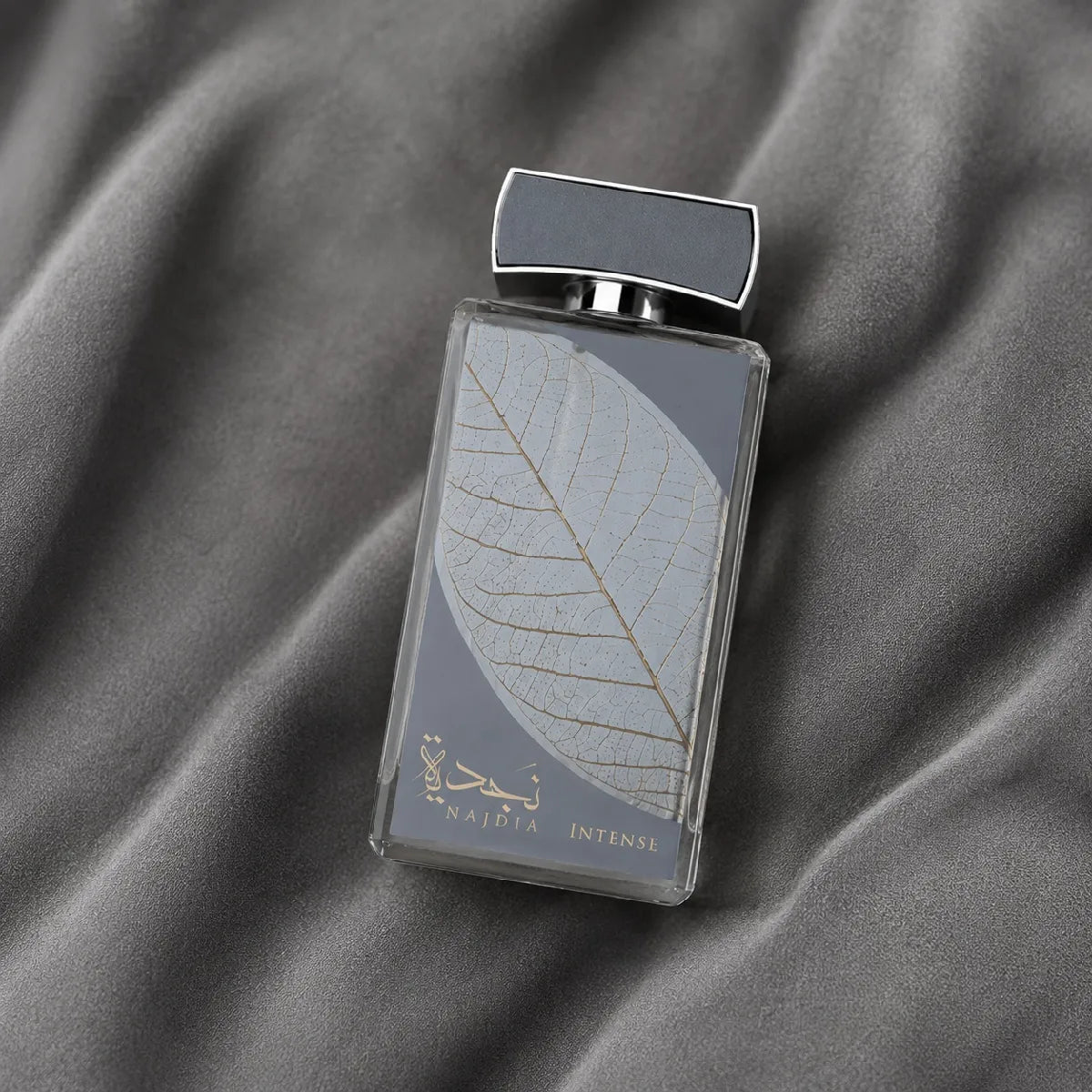 Lattafa Najdia Intense EDP 100 ml  showcasing a long-lasting fresh woody scent for modern men best in online Perfumesouq Qatar