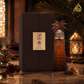 Lattafa Pride Ajwaa EDP 90 ml luxury unisex fragrance with elegant gold detailing, available online at Perfumesouq Qatar