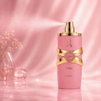 Lattafa Yara Elixir Eau de Parfum 100 ml bottle releasing a delicate fragrance mist, elegant women's perfume Perfumesouq Qatar