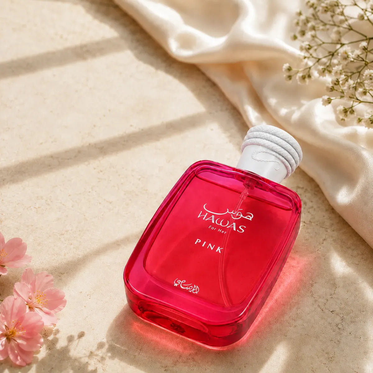 Rasasi Hawas Pink Eau De Parfum 100ml for best price in Qatar, elegant floral fragrance with long-lasting scent - perfumesouq Qatar