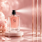 Giorgio Armani Si Eau De Parfum 100ml bottle standing next to its pastel pink packaging box on a marble surface Perfumesouq Qatar