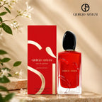 Giorgio Armani Si Passione Eau De Parfum 100ml vibrant red bottle standing next to its matching luxury red box packaging on a marble vanity surface perfumesouq qatar